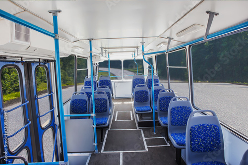 Interior of an empty bus moving on a country highway