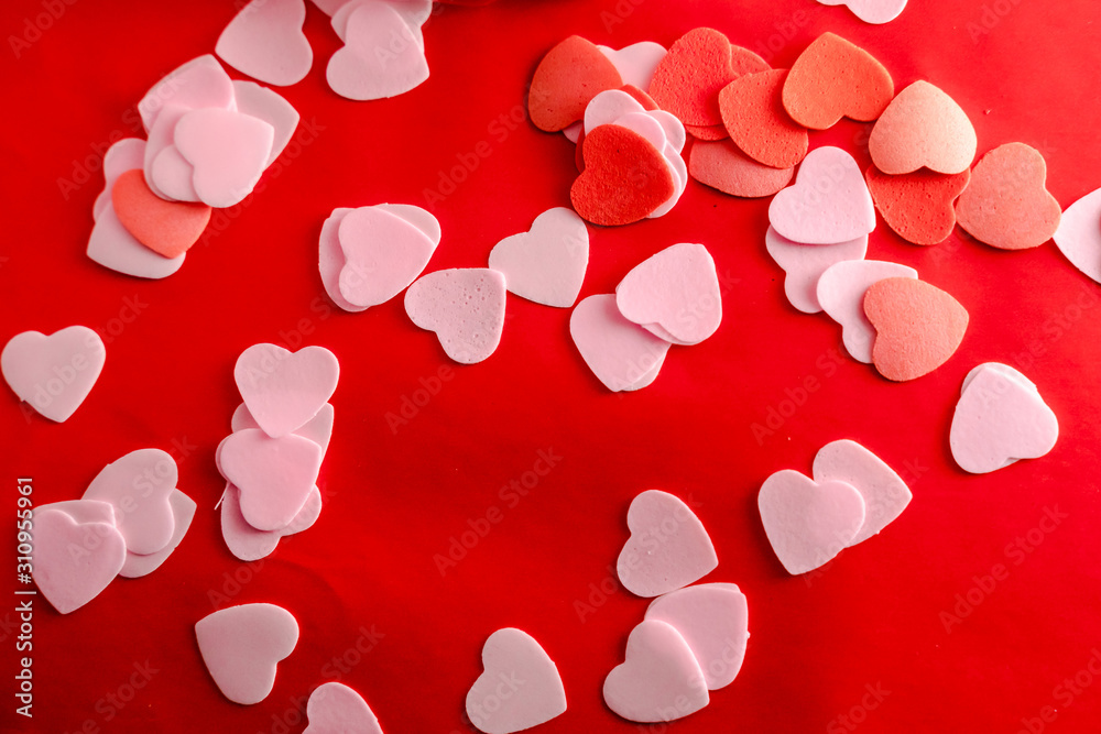 Valentine day concept. Soap red and pink Hearts with red background. Valentine day concept. Soap red and pink Hearts with red background.
