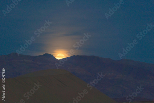 Moonrise over death valley national park, California