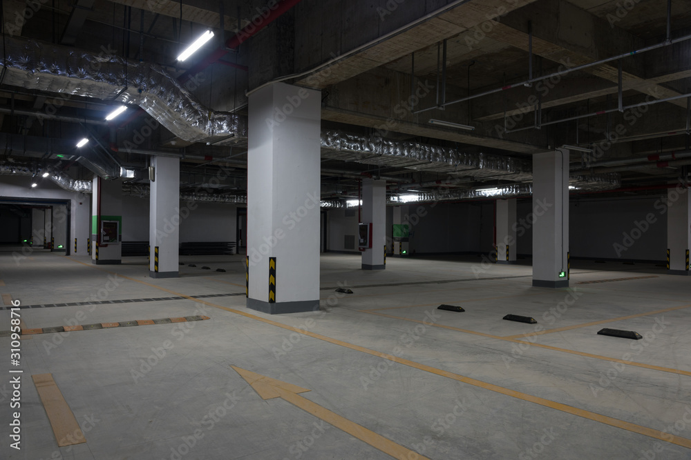Dim large underground parking space