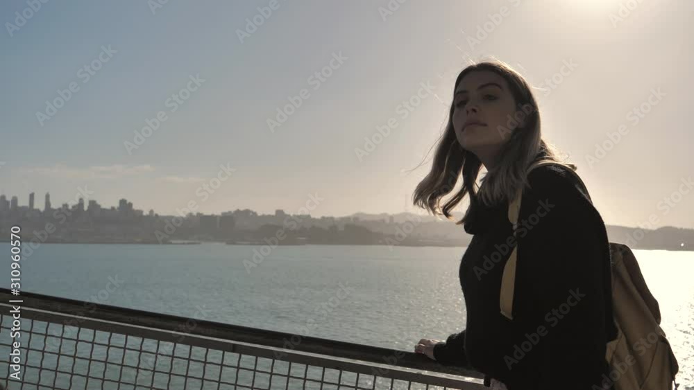 Attractive young woman tourist backpacking holidays travel San Francisco Attractive young woman tourist backpacking holidays travel San Francisco