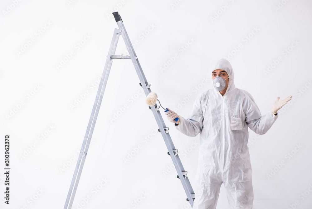 Painter working at construction site Painter working at construction site
