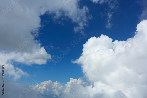 fluffy white cloud moving above dream sky background
