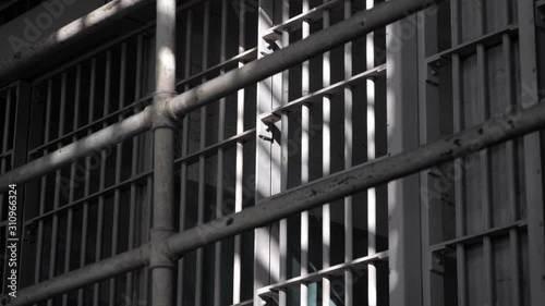 Penitentiary prison gaol jail cell iron bars correctional center B-roll