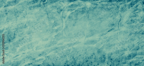 Gorgeous aquamarine blue green color background with textured grunge border with abstract cracks and paint spatter design