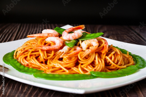 Stir fry noodle with shrimp and snow pea