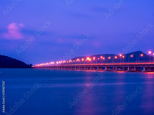 The beautiful highway bridge when night time light. © warawut