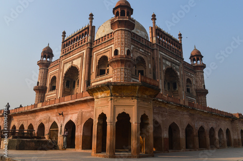 A mesmerizing view of safdarjung tomb memorial from the side of lawn at winter morning.