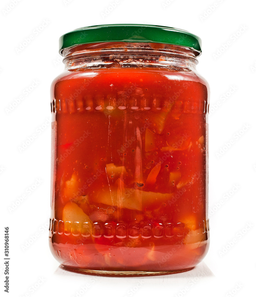 Salad vegetables canned in glass jar isolated on a white background. Salad vegetables canned in glass jar isolated on a white background.
