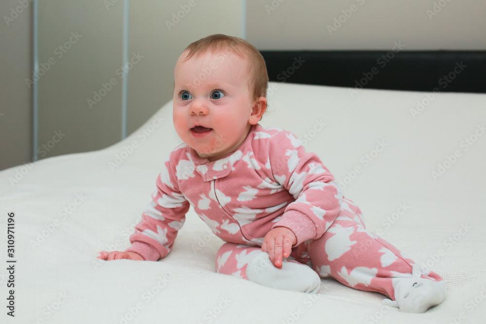 Close up Portrait of Cute Little 9 Month Old Baby Girl , with sticker Close up Portrait of Cute Little 9 Month Old Baby Girl , with sticker