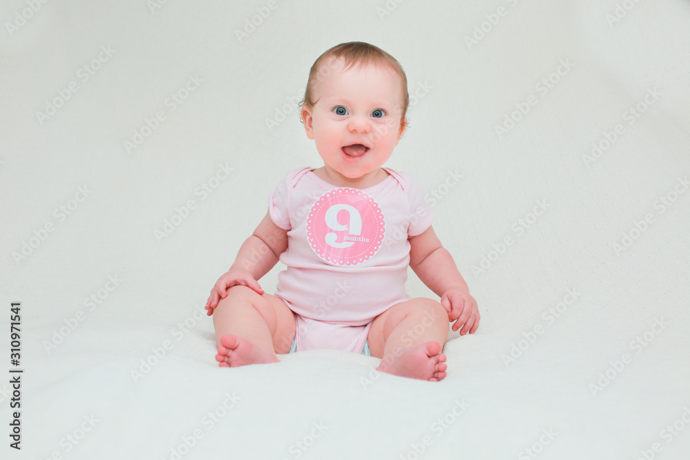Close up Portrait of Cute Baby Girl with Sticker 9 Month Old, Happy Baby Close up Portrait of Cute Baby Girl with Sticker 9 Month Old, Happy Baby