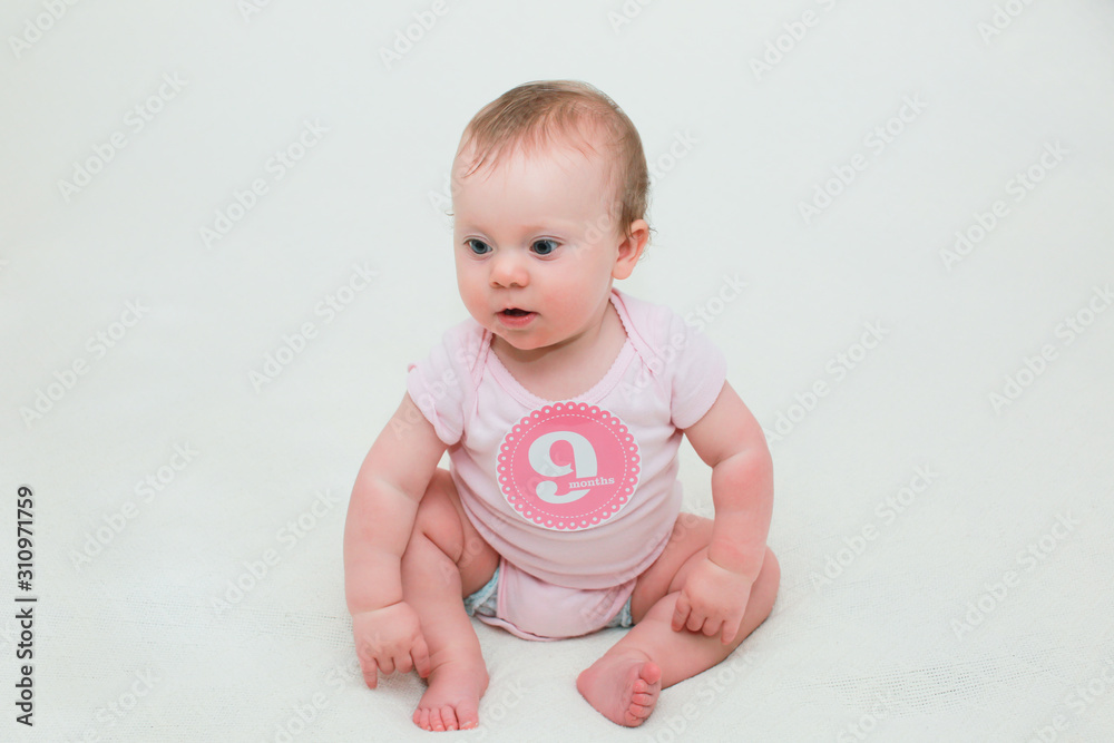 Close up Portrait of Cute Baby Girl with Sticker 9 Month Old, Happy Baby Close up Portrait of Cute Baby Girl with Sticker 9 Month Old, Happy Baby