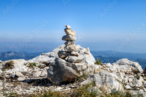 Pyramid of stones on peak of mountain. Lovcen national Park in Montenegro © nosyrevy