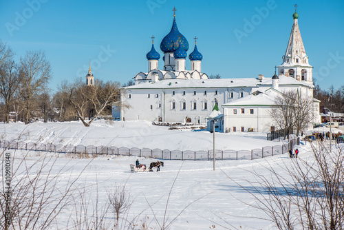 View of the Cathedral of the Nativity of the Virgin in the Kremlin of the ancient Russian city of Suzdal in winter. Golden Ring of Russia.