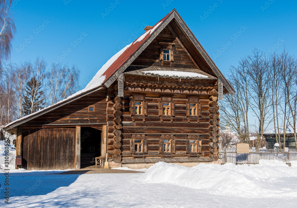 Typical old russian house covered with snow/ Winter Landscape/ Suzdal/ Russia/ Golden Ring of Russia Travel Typical old russian house covered with snow/ Winter Landscape/ Suzdal/ Russia/ Golden Ring of Russia Travel