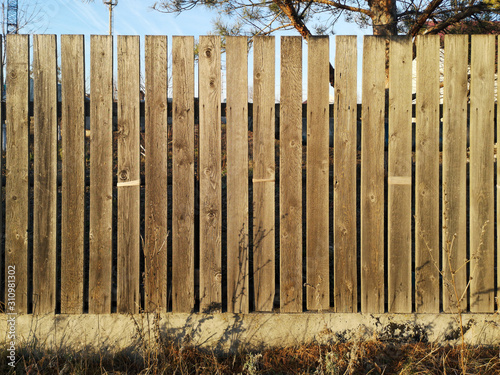 Wooden boards on the fence as a background