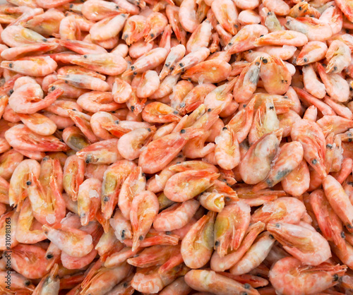 Red shrimp in the market as a background © schankz