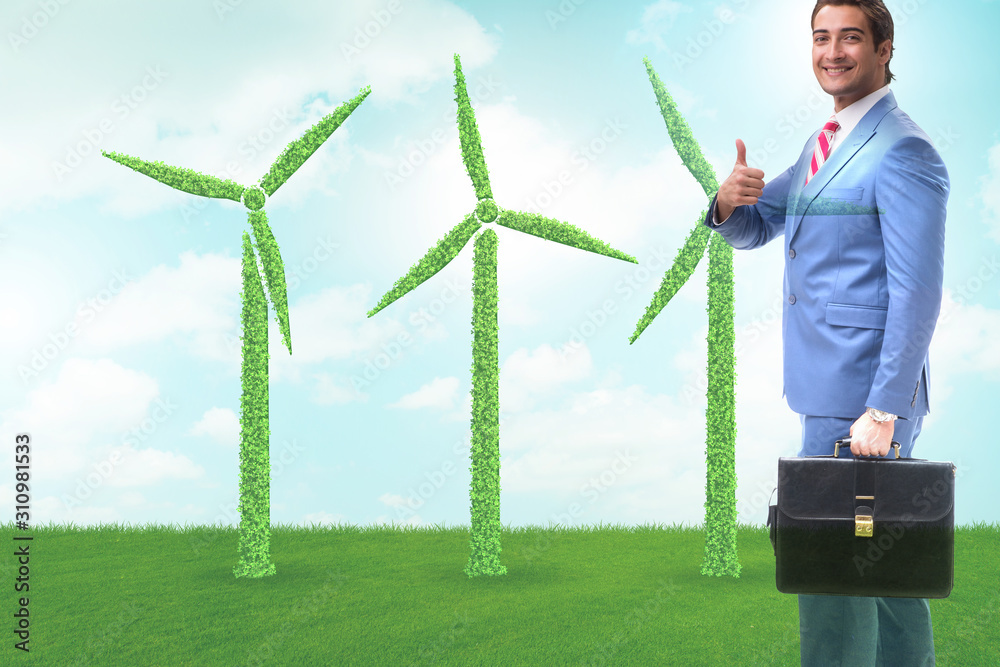 Green energy anc ecology concept with businessman Green energy anc ecology concept with businessman