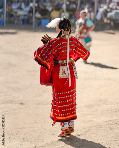 Powwow, woman dance. Native American Woman in Full Regalia. Santa Ynez Chumash Inter-Tribal Pow Wow. Woman performing.  photo