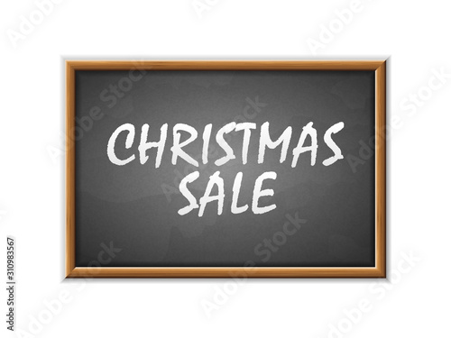Christmas sale written on a blackboard