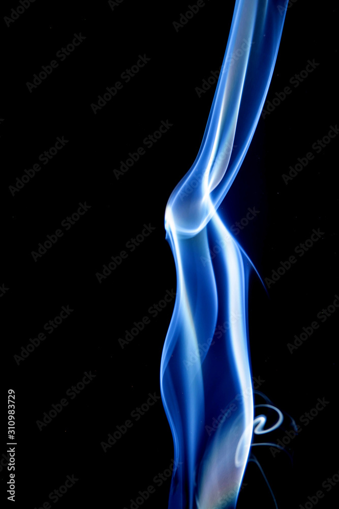 Abstract motion of white smoke isolated on a black background Can be modeled as hot food, smog, small clouds, and aromatic smoke. Abstract motion of white smoke isolated on a black background Can be modeled as hot food, smog, small clouds, and aromatic smoke.