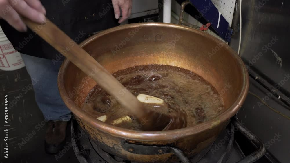 candy making fudge stirring fudge wide shot slide right candy making fudge stirring fudge wide shot slide right