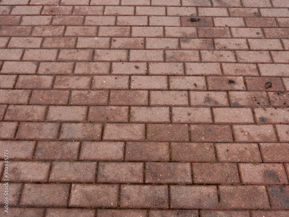 pavement of red paving stones backdrop pavement of red paving stones backdrop