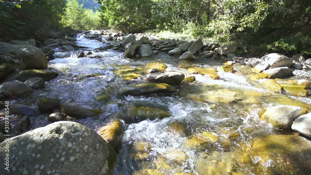 Mountain river, stream flow, water and stones, slow motion, landscape. Mountain river, stream flow, water and stones, slow motion, landscape.