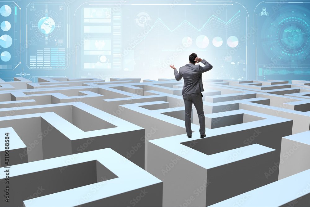 Businessman trying to escape from maze Businessman trying to escape from maze