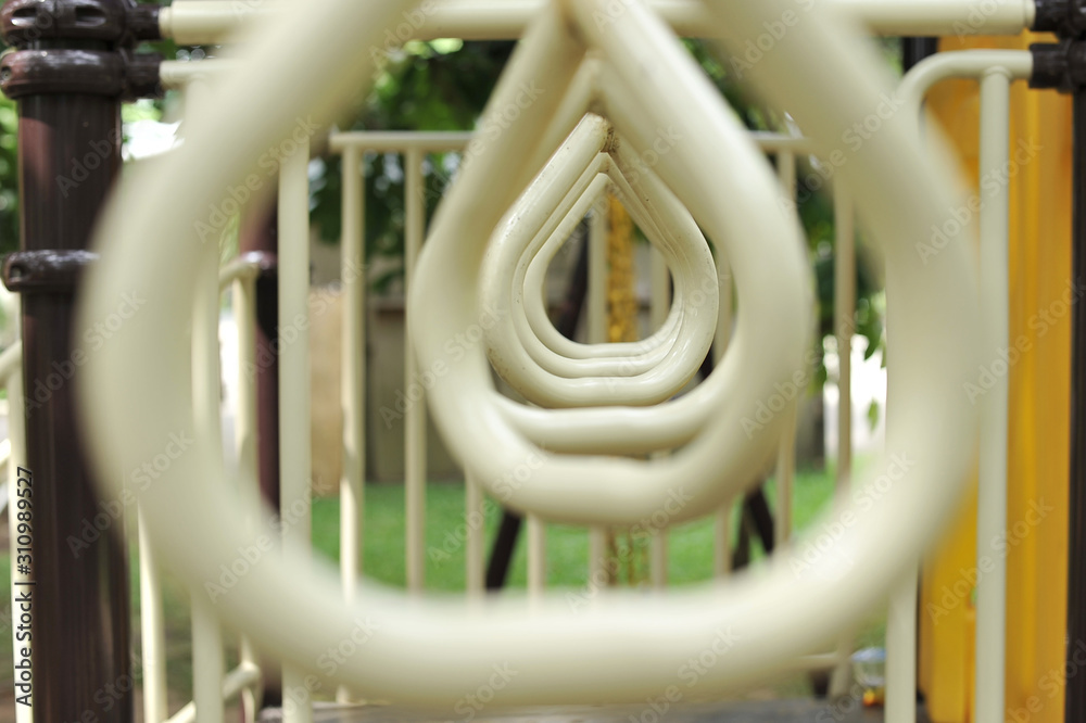Closeup view of monkey bars playground metal construction for pulling and climbing outdoor playground Closeup view of monkey bars playground metal construction for pulling and climbing outdoor playground