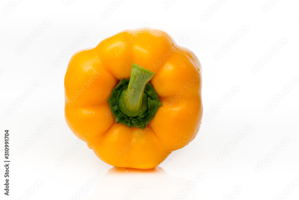 Fresh yellow pepper is isolated on a white background. Fresh yellow pepper is isolated on a white background.
