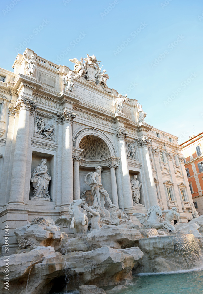 Famous large fountain of Trevi in Rome Italy