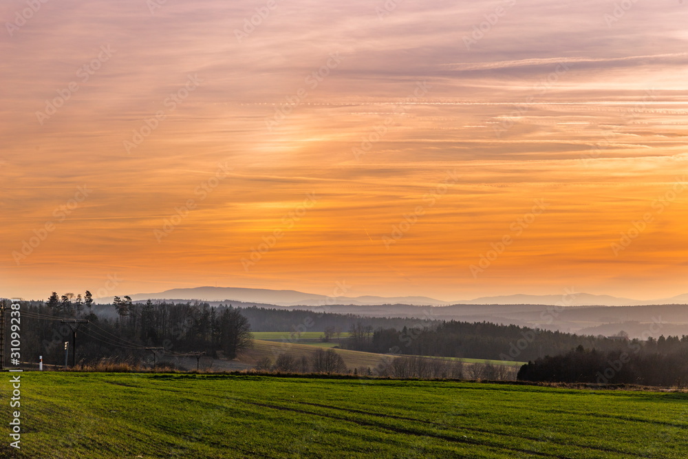 Rural landscape with a hills at sunset with warm light. Czech countryside. Rural landscape with a hills at sunset with warm light. Czech countryside.