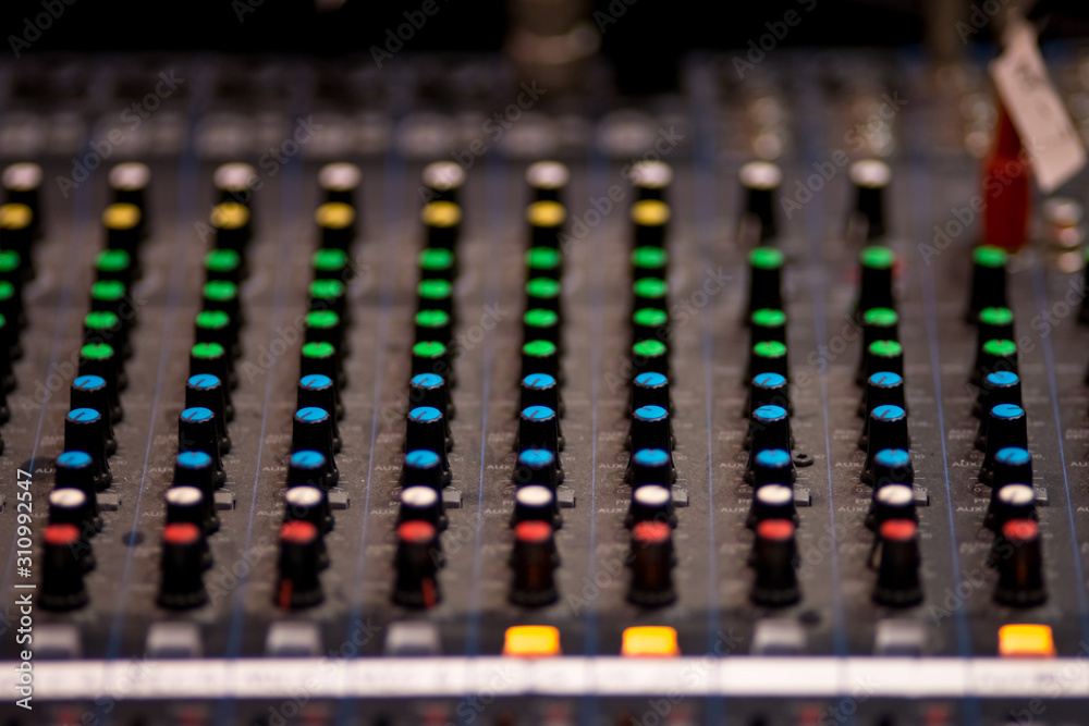 Part of audio mixer and music equipment for sound mixer control electronic device sound check. Part of audio mixer and music equipment for sound mixer control electronic device sound check.