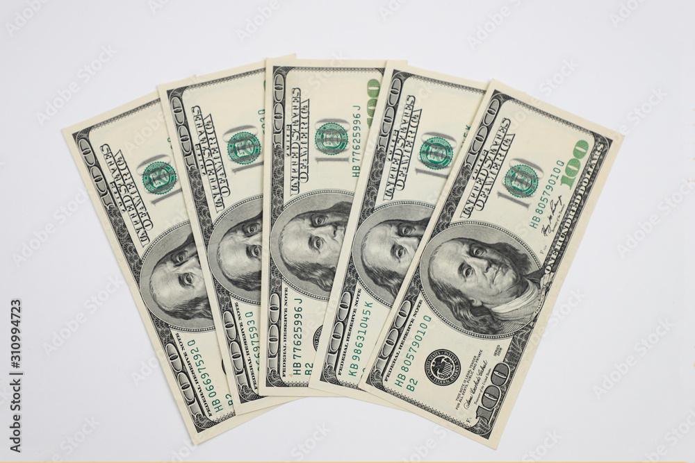 Hundred dollar bills, on a white background. Hundred dollar bills, on a white background.