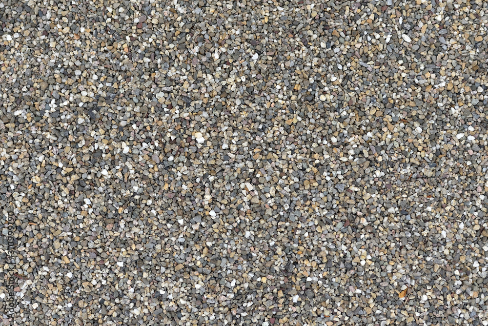 Texture of small pebbles for sidewalks and paths in the garden, closeup Texture of small pebbles for sidewalks and paths in the garden, closeup