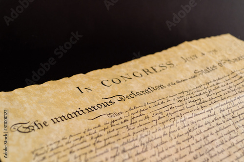 The Declaration of Independence and Constitution of the United Sates of America, isolated on black background