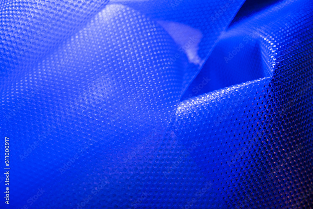 Naklejka premium Plastic in blue color. Environmental protection. Utilization of wastes.