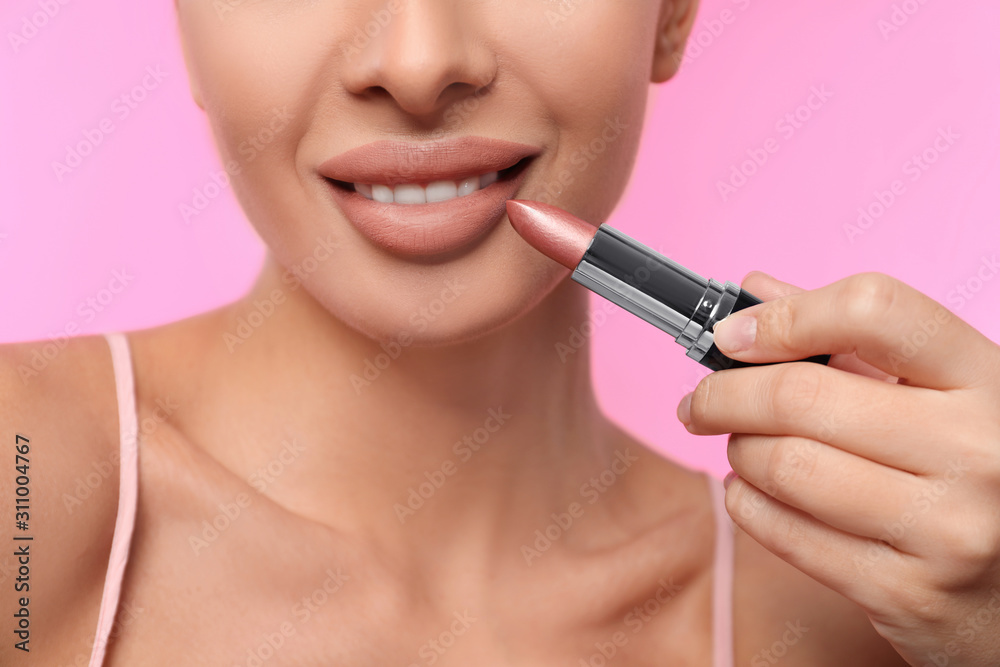 Woman with matte lipstick on pink background, closeup Woman with matte lipstick on pink background, closeup
