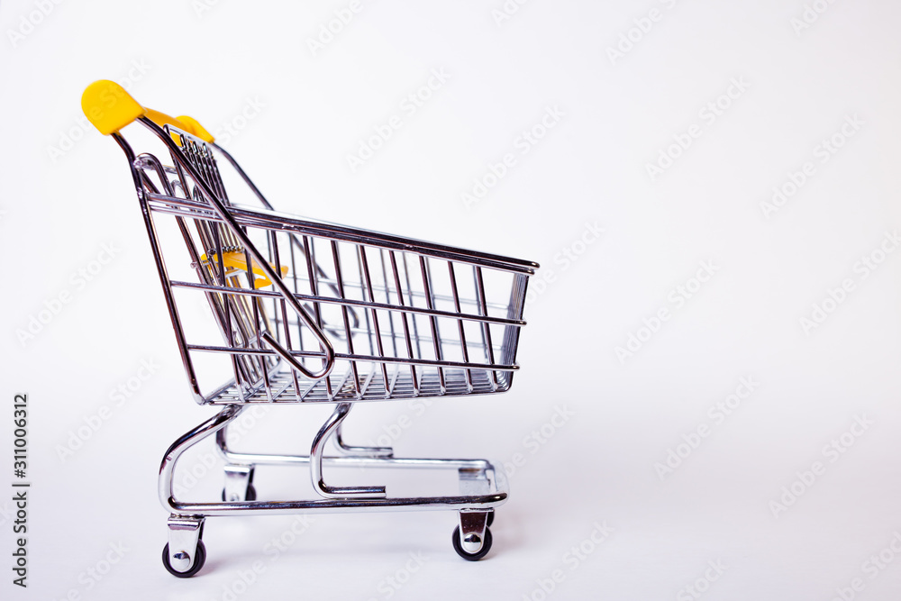 Shopping cart concept of shopping and sales, retail and shops. Shopping cart concept of shopping and sales, retail and shops.