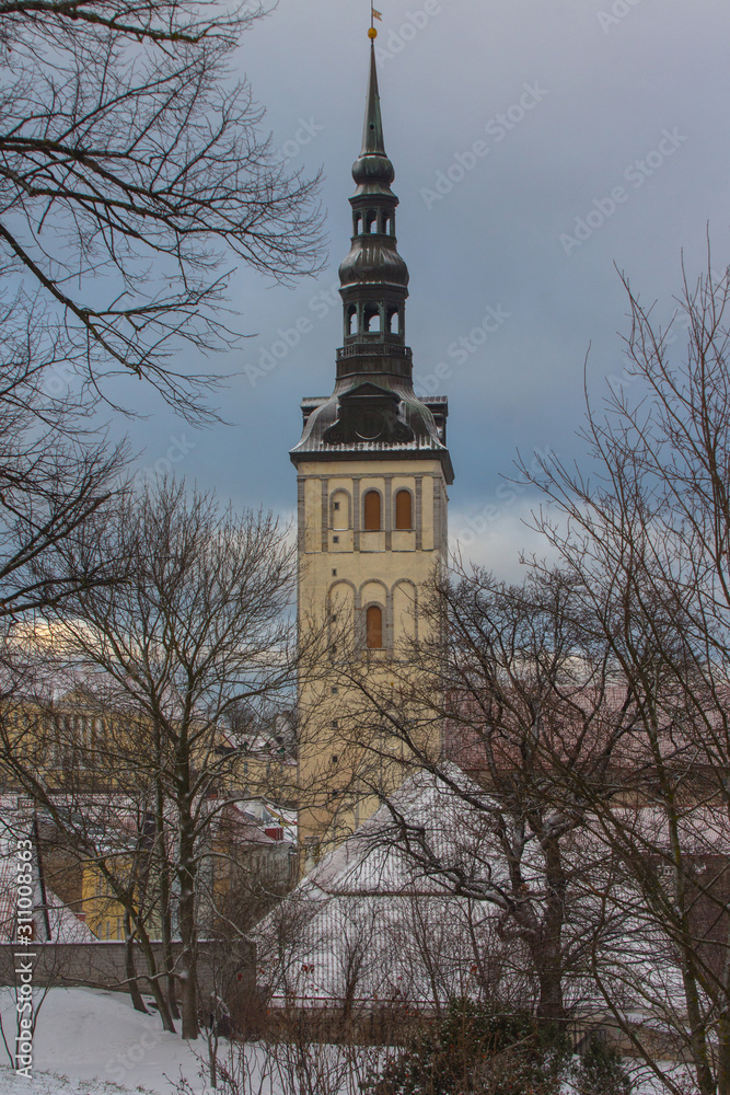 View of St. Nicholas Church in Tallinn Old Town in winter. Estonia