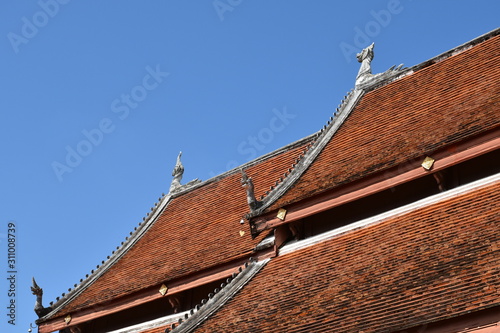 The art of temple roof, Wat Nhong Bua temple, Nan, Thailand. photo