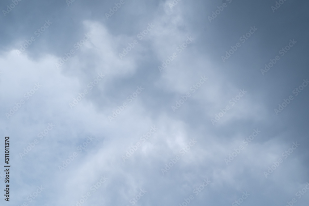 Beautiful white clouds and blue sky high definition skyscraper with grunge texture for background Abstract,nature art style,soft and blur focus.