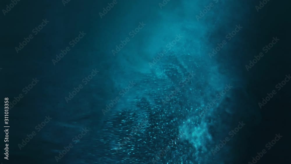 Paint fall into water which is twist. Spin acrylic ink drip into liquid. Visual effect bullet time, frozen moment, flow motion. Cloud fraction of color is spray drop. Slow motion cosmic video magic.