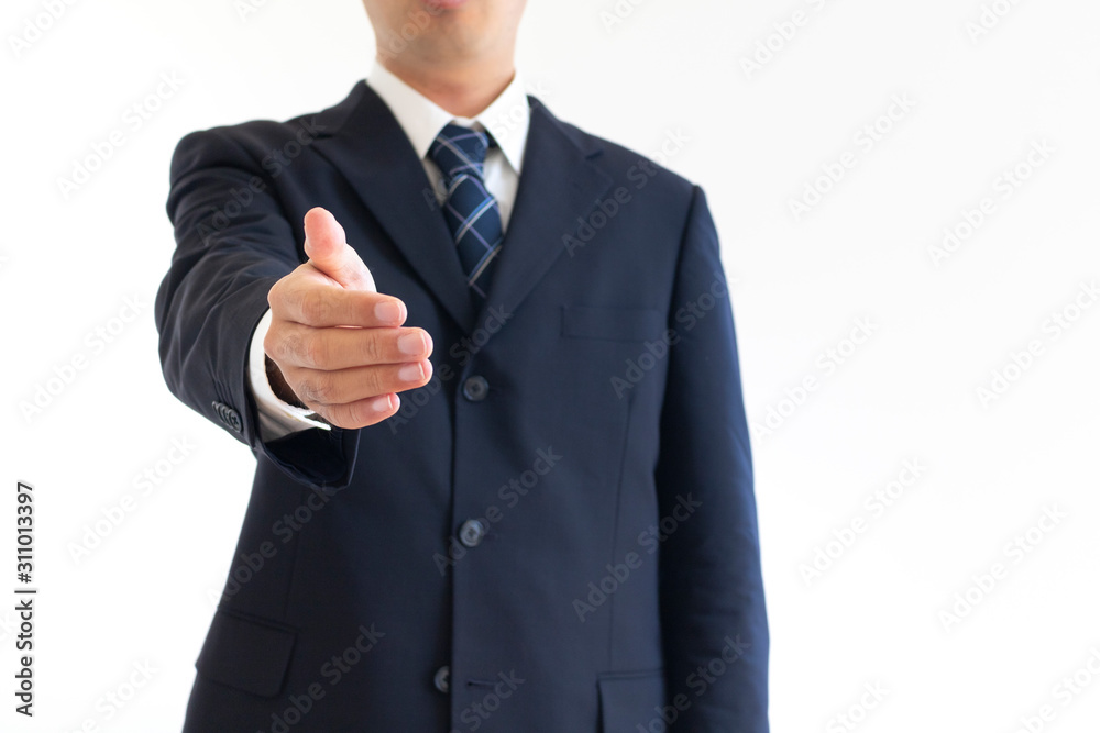 握手を求めるスーツを着た男性 握手を求めるスーツを着た男性