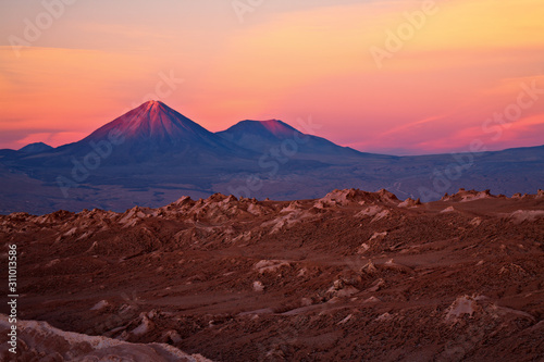 sunset over volcanoes Licancabur and Juriques, Chile