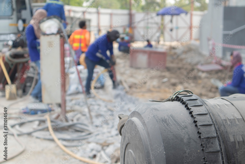 Fototapeta premium Air filter in a black wind generator While the workers work to extract the concrete