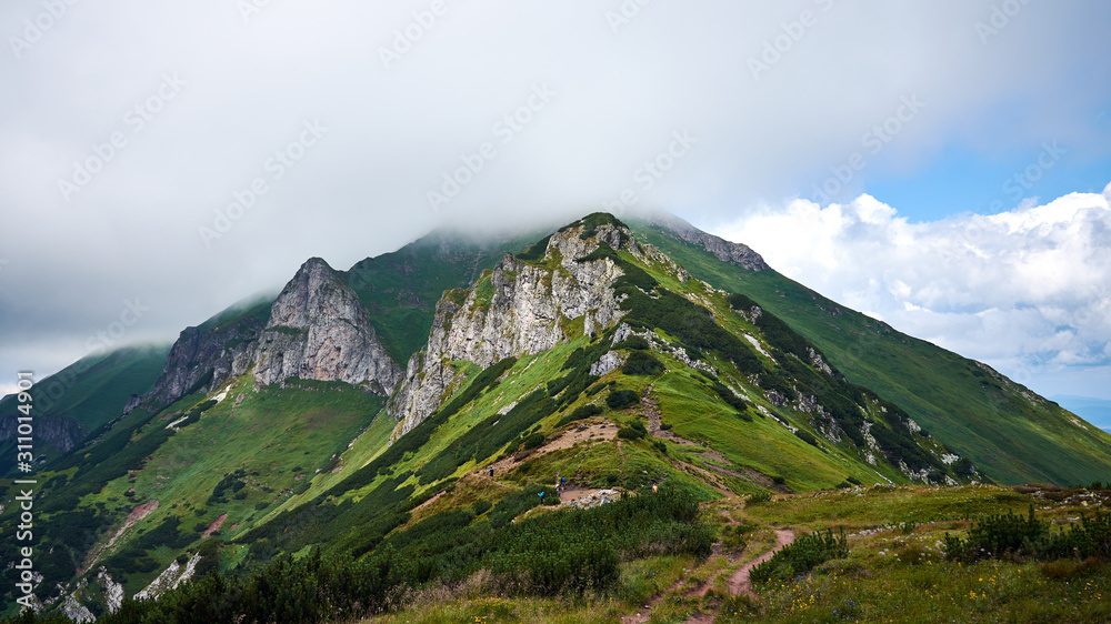 Fototapeta premium Mountain range mid cloudy day landscape shot, High Tatras Slovakia