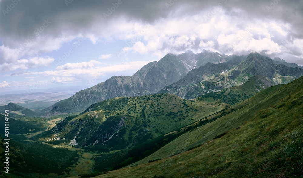 Mountain range mid cloudy day landscape shot, High Tatras Slovakia
