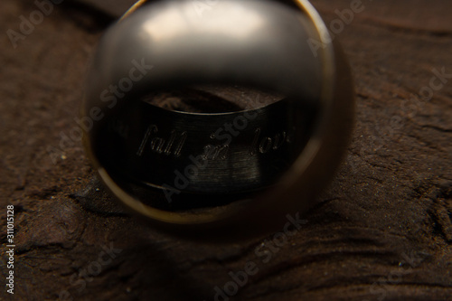 gold and silver inscribed ring 2